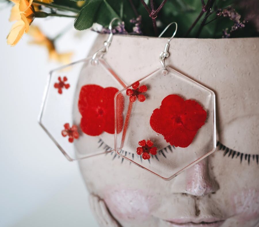 Red Flowers Encased in Resin Earrings Hanging from Flowerpot