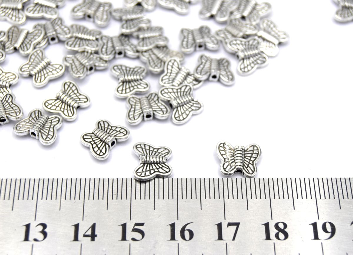 Perles métal papillon argent vieilli 10mm - lot de 20/40 unités