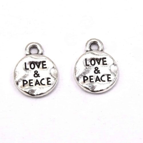 Pendentif tibétain plat rond avec le mot amour et paix.