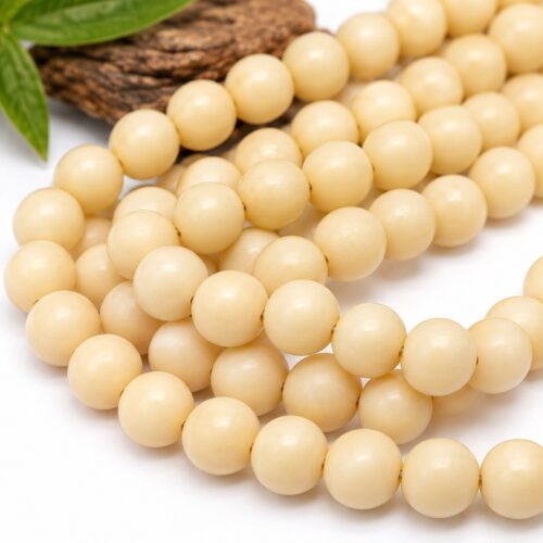 Perles en Tagua naturelle 8 mm, aussi appelées ivoire végétal.