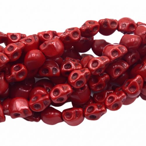Perles tête de mort rouge brillantes 6x8mm gros plan