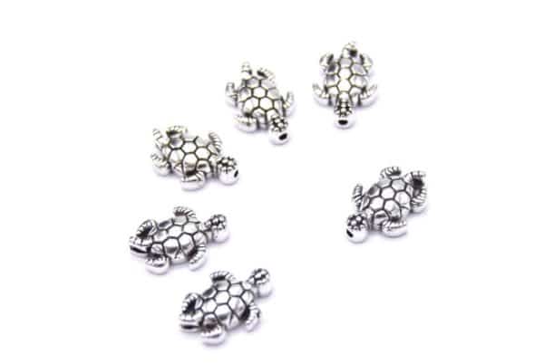 Perles métal tortue de mer argent tibétain