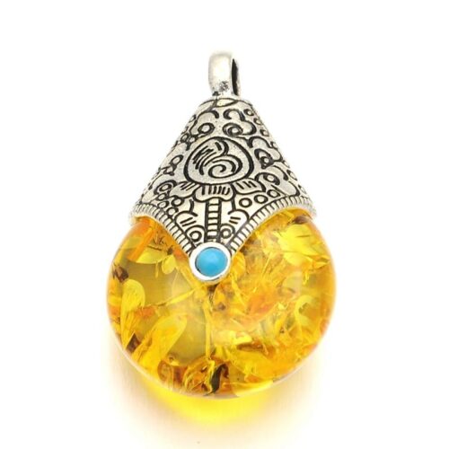 Pendentif tibétain en résine forme de larme 38mm couleur ambre x1