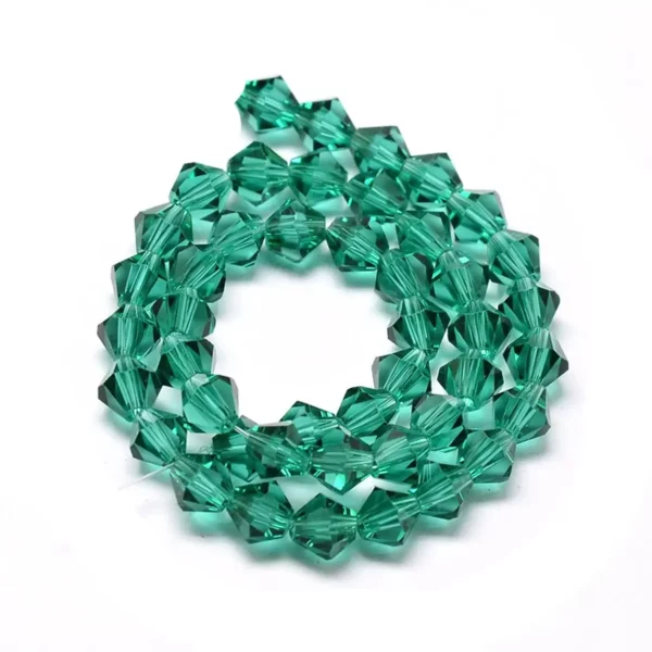 Perles de verre toupies à facettes vert