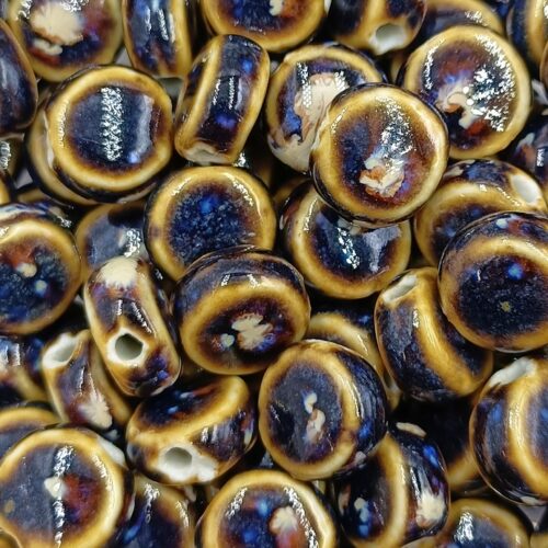 perles en porcelaine-marron-coco-forme-galet.jpg