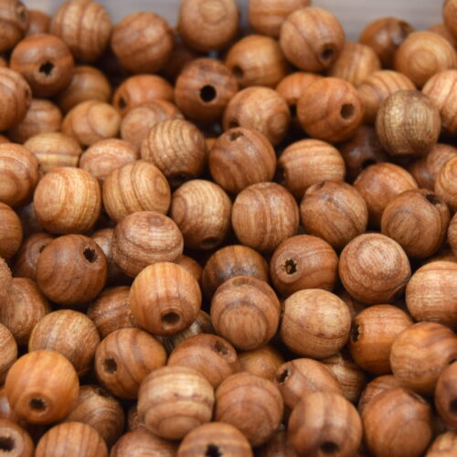 perles artisanales en bois de frêne de Corse