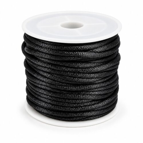 un rouleau de cordon en nylon noir 2mm et 1.5mm dévidoir blanc